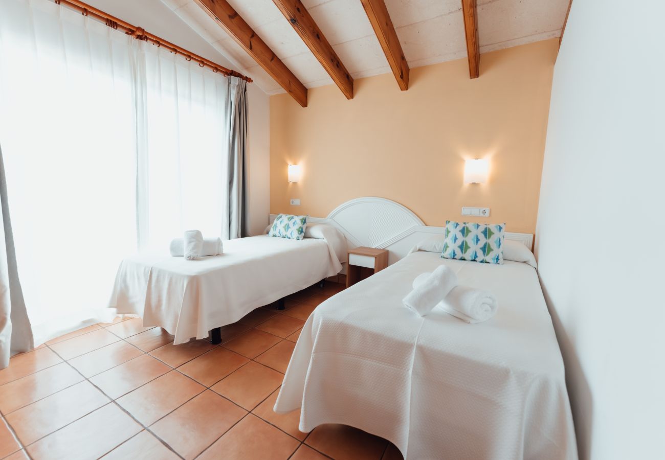 Villa in Cala Blanca - Villas Amarillas by Escape Home